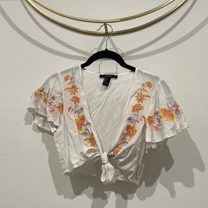 Floral embroidered tie front crop top